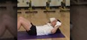Do a towel crunch abs exercise