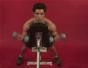 Exercise with the dumbbell bicep curl on incline bench