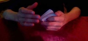 Perform the pop-out flourish card trick