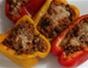 Make stuffed peppers packed with ground turkey, rice, tomato sauce & spinach