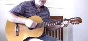 Play "Happy Birthday to You" on an acoustic guitar