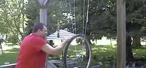 Make a wheel spin with angular momentum & inertia