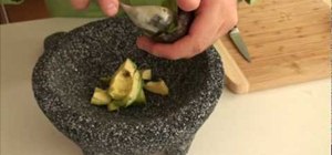 Impress your guests with an authentic guacamole dip made with a molcajete
