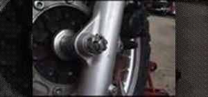 Remove the front wheel of a Kawasaki KLR650