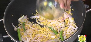 Make a spinach moong dal fry with green chili peppers