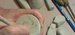 Make a personal seal or signet out of smooth clay