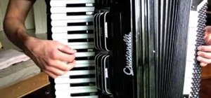 Play "The Godfather Waltz" on the accordion