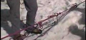 Reverse the crevasse rescue system to lower a victim