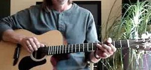 Play a G blues progression on acoustic guitar