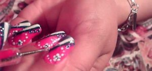 Paint your nails with a pink and blue art design