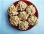Make your own popcorn balls with  mini marshmallows and caramel