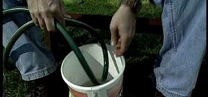 Repair a damaged garden hose using a coupling sleeve