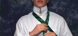 Tie a skinny necktie in a four-in-hand knot