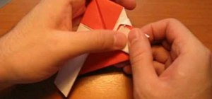 Make a Santa Claus from folded paper with origami
