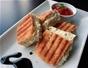 Make a grilled cheese sandwich with tomato, goat cheese and asiago