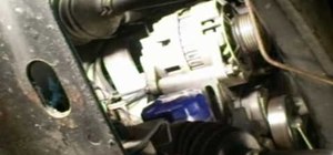Remove the alternator from a Saturn S-Series car