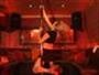 Do the back hook spin when pole dancing