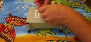 Take apart the Xbox 360 and the console disc drive