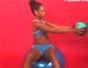 Do trunk rotation on stability ball with medicine ball
