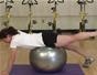 Do an alternating superman back exercise on a ball