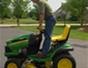 Use John Deere riding lawn equipment safely