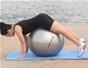 Do a prone hip extension on a ball