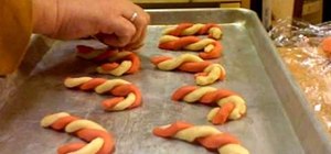 Bake candy cane shaped Christmas cookies