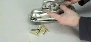 Use a butterfly style trailer coupler lock