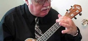 Play "Blue Moon" by Rodgers & Hart on the ukulele