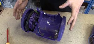 Replace the cable rewind on a Dyson DC05 vacuum