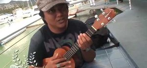 Play a basic strum pattern on the ukulele as a beginner