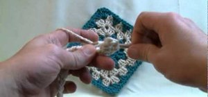 Hand crochet your first project with a crochet needle and yarn