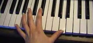 Play an easy version of the Tetris theme song "Korobeiniki" on piano