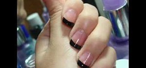 Apply a french tip manicure with black nail polish
