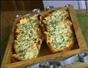 Make garlic bread with parsley and cheese