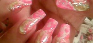 Paint your nails in a pink and orange art design