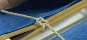 Tie a two handed surgical square knot