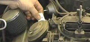 Drain a radiator in preparation for removing the motor