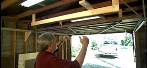Use the space above a garage door with a storage rack