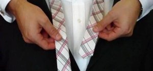 Tie a necktie with the four-in-hand knot