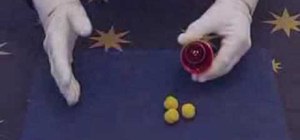 Perform the cups and balls magic trick