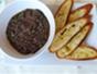 Prepare a savory tapenade with capers and anchovies