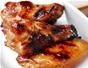Grill chicken wings with soy sauce, paprika, and sugar