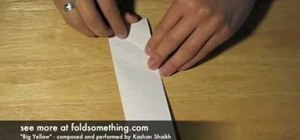 Do basic folds to make a paper football