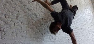 Perform a yoga handstand for beginners