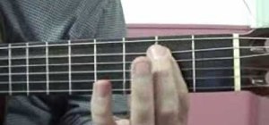 Play the Beatles' "Day Tripper" on acoustic guitar