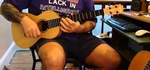 Play "A Land Down Under" by Men at Work on baritone ukulele
