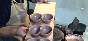 Throw double bowls on a pottery wheel