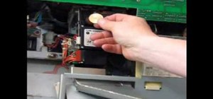 Install a coin into the comparitor of a slot machine