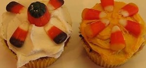 Decorate candy corn-covered vanilla cupcakes for Halloween